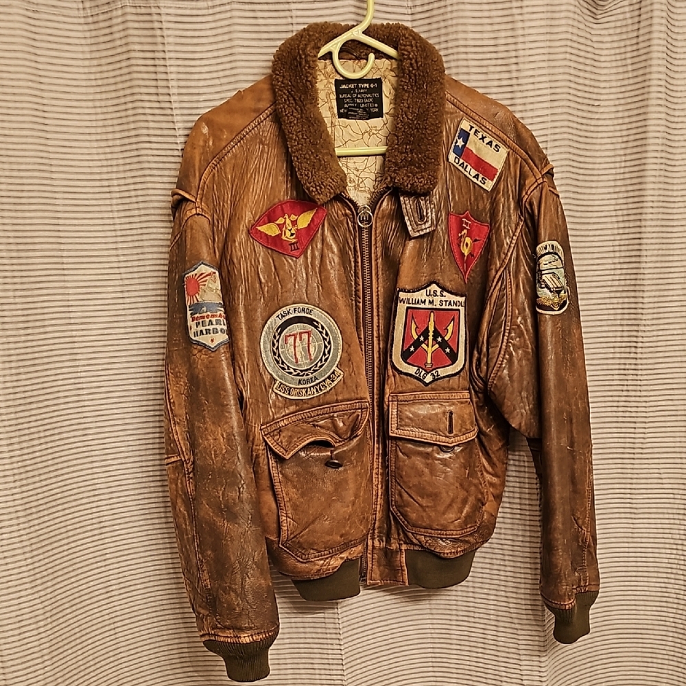 Heavy Leather Bomber Flight Jacket with Actual Relevant Patches sewn in.